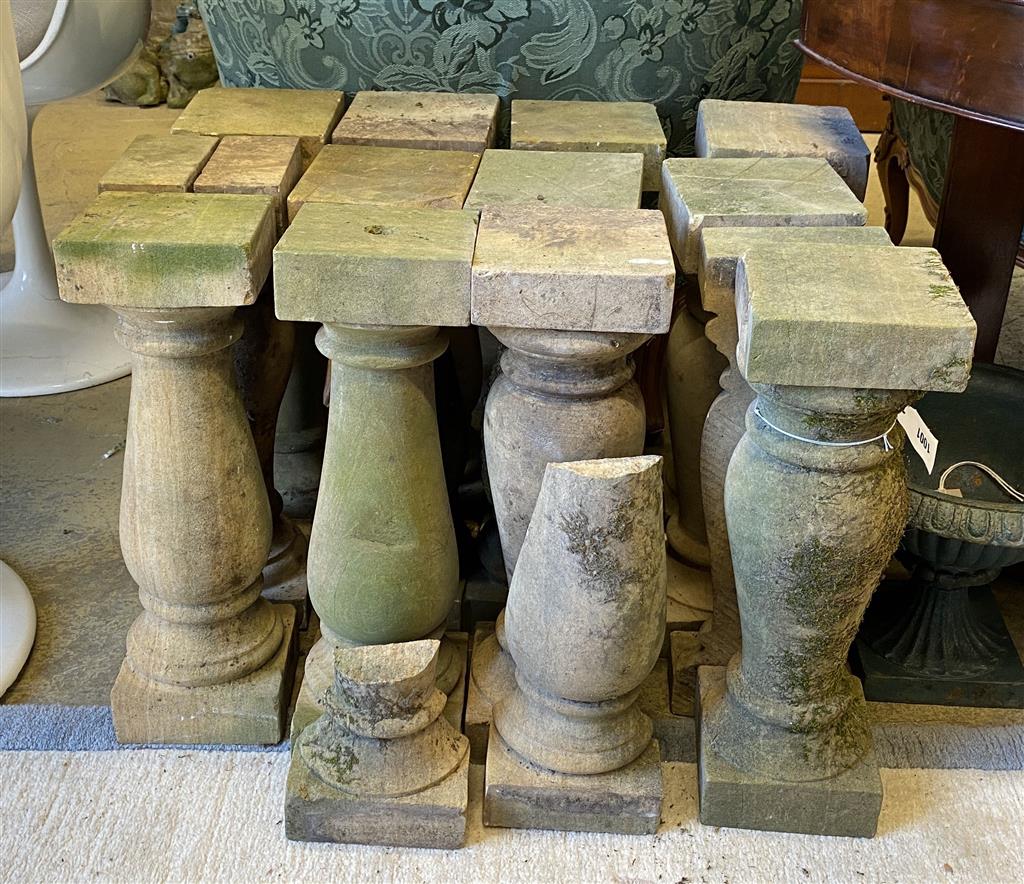 Fourteen terracotta baluster pillars, height 48cm